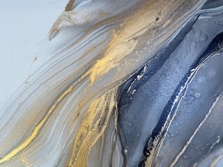 Abstract grey art with gold — black and white background with beautiful smudges and stains made...