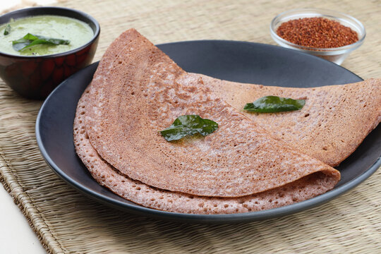 Ragi Dosa or finger millet grain. with mint chutney, SouthIndian healthy breakfast
