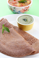 Ragi Dosa or finger millet grain. with mint chutney, SouthIndian healthy breakfast