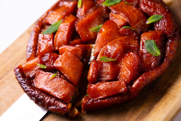 Papaya tarte tatin. Traditional French recipe without apple but with tropical fruit.