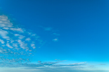 Blue sky with white clouds. Clear sunny day
