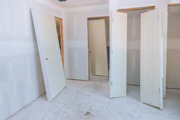 A new home interior wooden stacker doors a wait installation