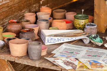 Equipment and workshop of a medieval scribe and painter. Organic colors papyrus and medieval...