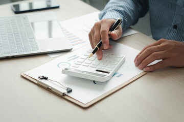 bookkeeper or financial inspector hands making report, calculating or checking balance. Home finances, investment, economy, saving money or insurance concept