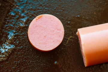 Sausages in a frying pan