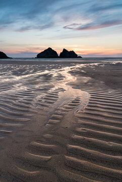 Absolutely beautiful landscape images of Holywell Bay beach in Cornwall UK during golden hojur sunset in Spring © veneratio