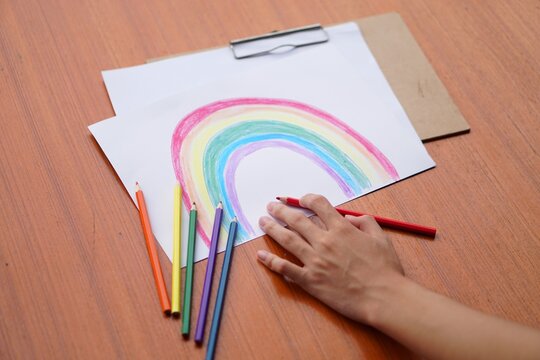 Hand drawing picture of rainbow. Concept celebration of Lgbt in pride month, June 2021.