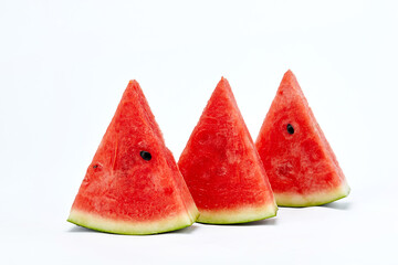 Fresh watermelon and watermelon slices.