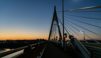 Fototapeta na wymiar Bridge in the sunset, 오후와 밤의 경계선