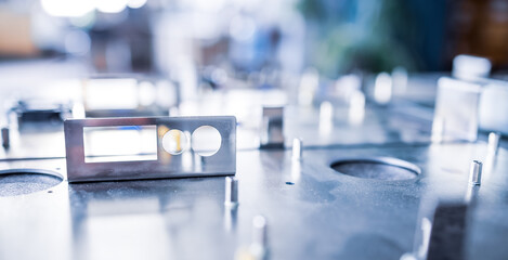 Metal boards and accessories lie on the surface