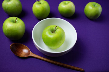 green apple on a plate