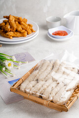 Traditional Indonesian Food : Fried Otak Otak is a Southeast Asian fish cake made of ground fish meat mixed with Chili Sauce 