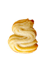 curly vanilla cookies on a white plate, homemade pastries