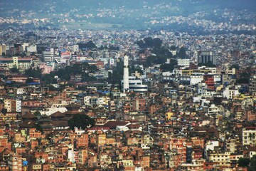 Fototapeta na wymiar City view of Kathmandu with Dharahara Tower. Taken in 2013.