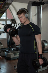 Fototapeta na wymiar man with weight training equipment on sport gym club