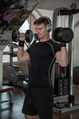 Fototapeta na wymiar man with weight training equipment on sport gym club