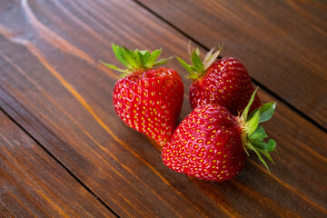 strawberries on wooden table
