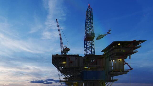 Helicopter flying from oil rig platform towards beautiful sunrise