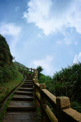 Fototapeta na wymiar Stairway hiking on high cliff mountain