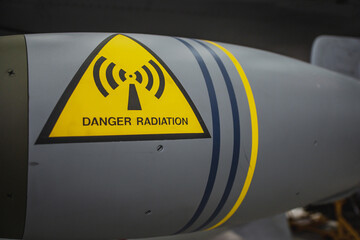 Duxford England May 2021 Danger Radiation sign on a bomb of a fighter jet airplane, most likely...