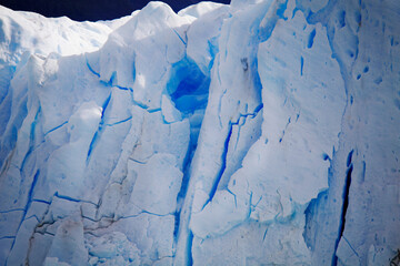 Perito Moreno glacier ice break and lake. Huge wall of ice