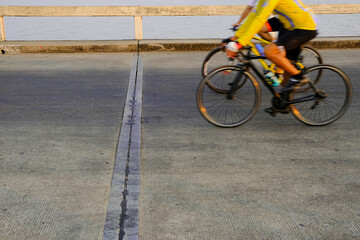 first biker man winner to finish line. sport aerodynamic activety outdoor wheel cycle on concrete...