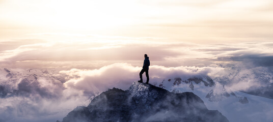Magical Fantasy Adventure Image Composite of Man Hiking on top of a rocky mountain peak. Background...