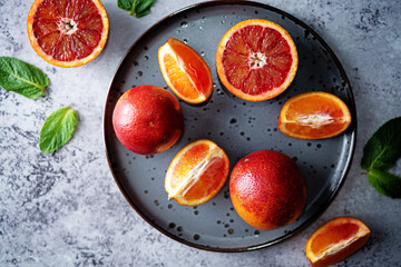 Red oranges with mint leaves