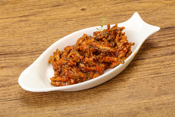 Canned anchovy in tomato sauce