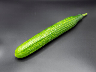 cucumber on a black background