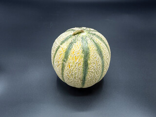 melon on a black background