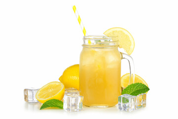 Summer iced green tea lemonade in a mason jar glass with paper straw, lemons and ice cubes isolated...