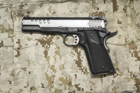 M1911 pistol weapon on Marine Desert camo