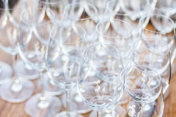 Wine glasses on the wood table background