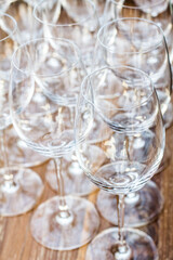 Wine glasses on the wood table background