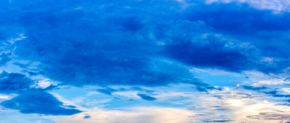Fototapeta na wymiar shiny blue sky in the evening before the sunset panorama