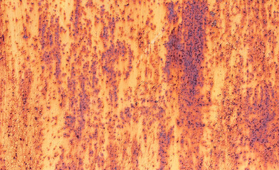 Abstract background of metal rusty wall with peeling paint
