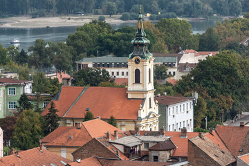 Fototapeta na wymiar View of Zemun rooftops and Uznesenja Blazene djevice Marije church. Belgrade, Serbia