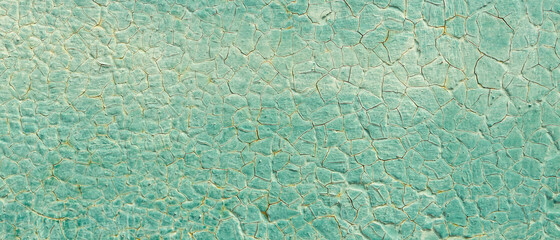 Cracked turquoise paint texture. Old crackled teal turquoise painted wood surface. Green turquoise...