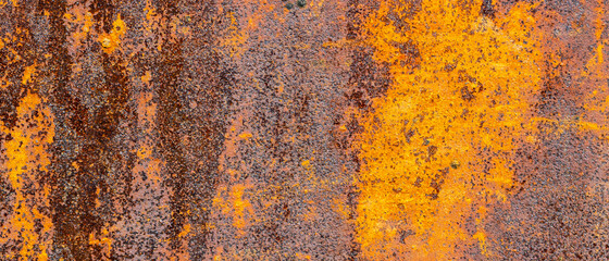 Rusty metal texture. Background of peeling paint and rusty old metal. Metal texture with scratches and cracks as a background