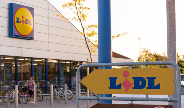 BEKESCSABA, HUNGARY, 08 JUN 2021 - The LIDL signboard, indicates the direction towards the entrance. The supermarket is also visible.