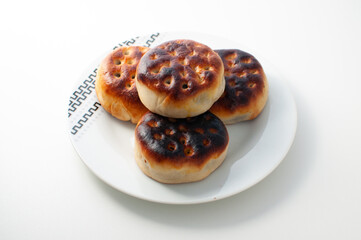 Manju - a traditional japanese food - in a white plate on a white table or background