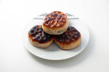 Manju - a traditional japanese food - in a white plate on a white table or background