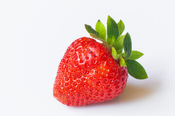 Strawberry. One Berry isolated on a white background 