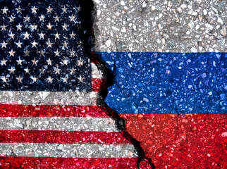 Flags of Russia and America on stone background. Abstract symbolic representation of relations between the two countries