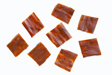 Dried mango paste on white background.