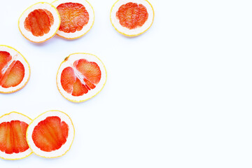 High vitamin C. Juicy grapefruit slices on white.