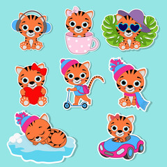 Stickers in the form of tiger cubs.Stickers in the form of the symbol of the year 2022.Vector illustration.Pins, badges and stickers .Cute sticker set