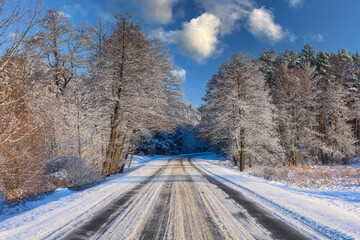 Snowy road during cold winter morning