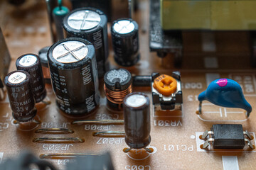 A closeup on part of a DVD player circuit board